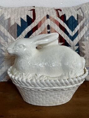 A Vintage White Ceramic Bunny Resting Covered Dish on an Oval Basket Style Base